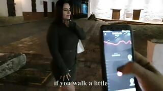 The horny woman loves the vibrator's feeling in the public