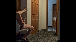 A blonde mature lady leaves the door open while masturbating